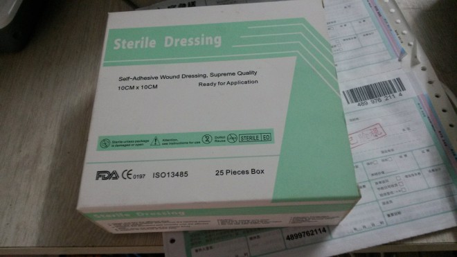adhesive surgical dressing